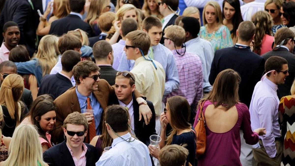 In this 2013 file photo, college students filled the paddock on Scholarship Day and opening day at Keeneland Race Course.