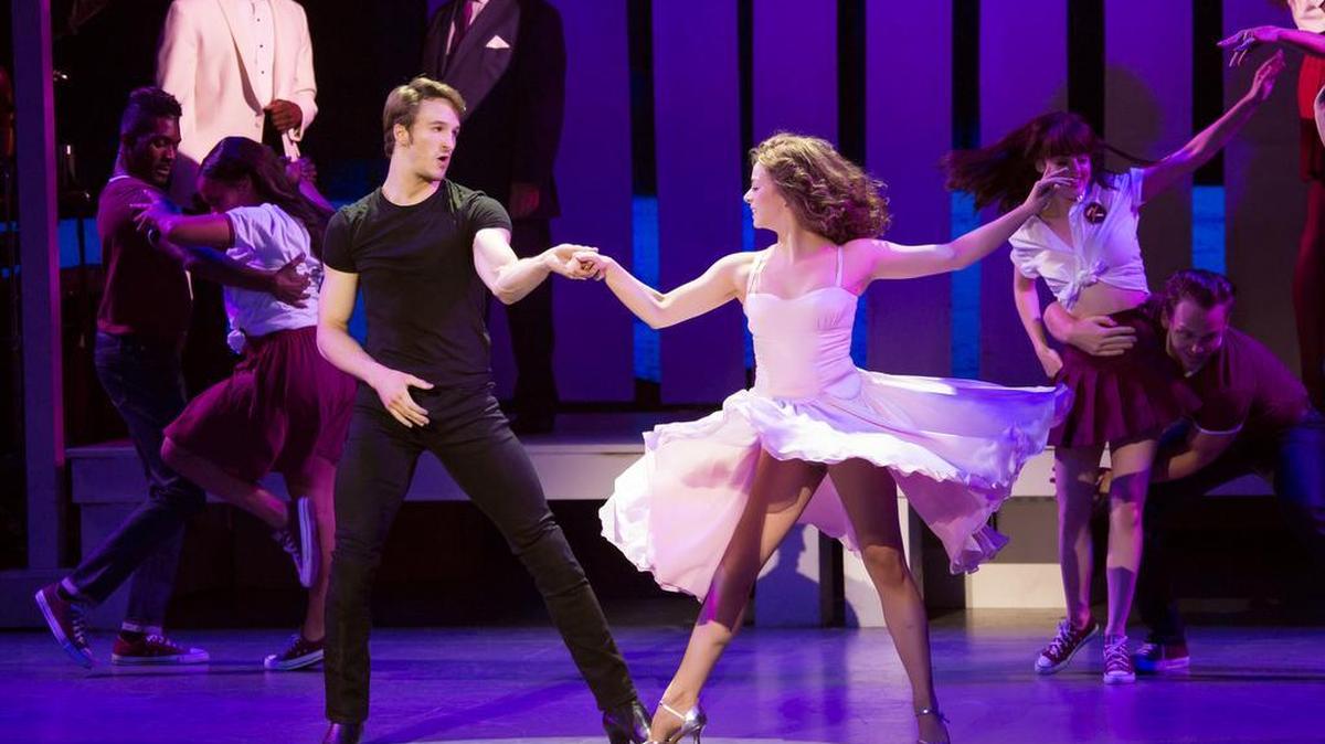 Aaron Patrick Craven plays Johnny Castle and Kaleigh Courts is Baby in “Dirty Dancing — The Classic Story on Stage,” playing this weekend at the Lexington Opera House.