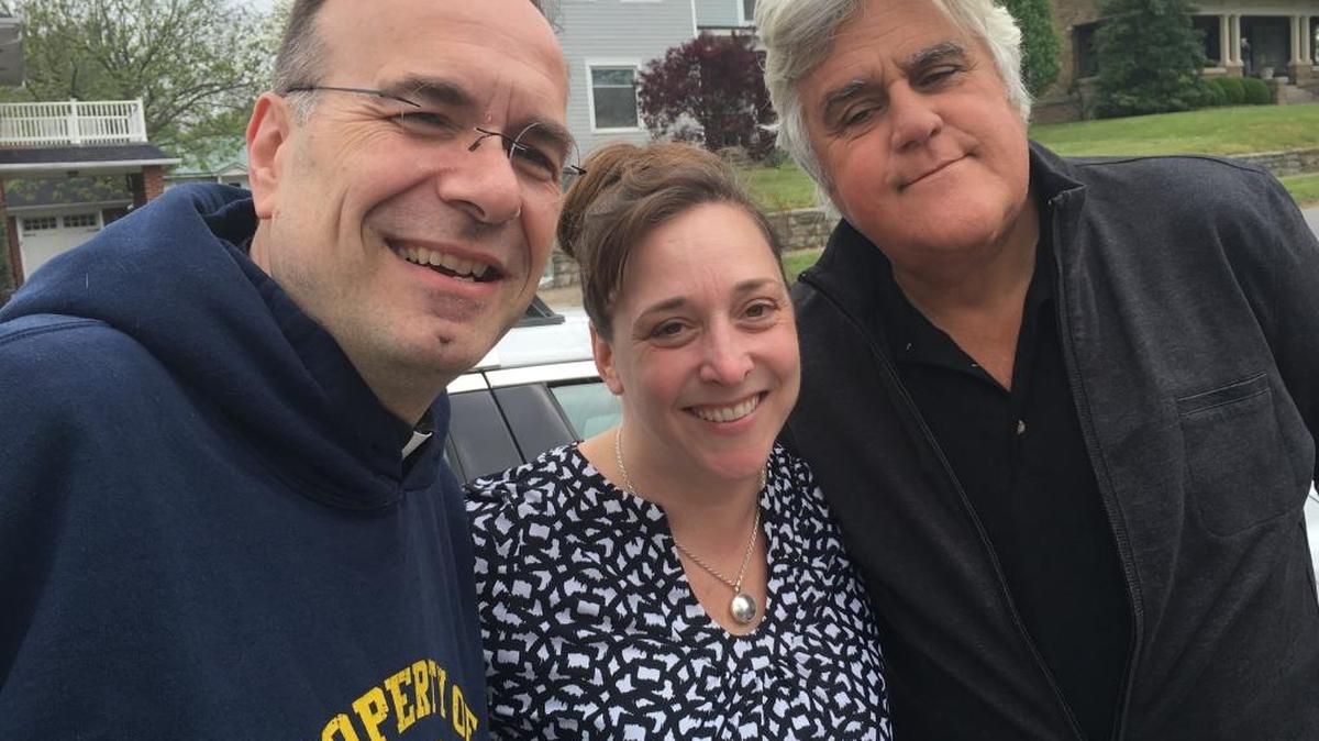 Father Jim Sichko, left, WUKY-FM reporter Karyn Czar and comedian Jay Leno in Richmond April 23.