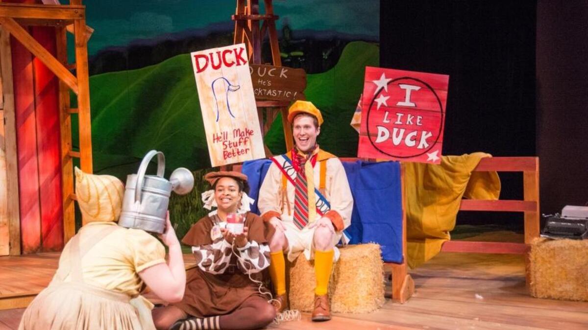 Ashlee Collins, left, plays Hen, Jess Cummins is Cow and Tanner Gray is the title character in “Duck for President” at Lexington Children’s Theatre.