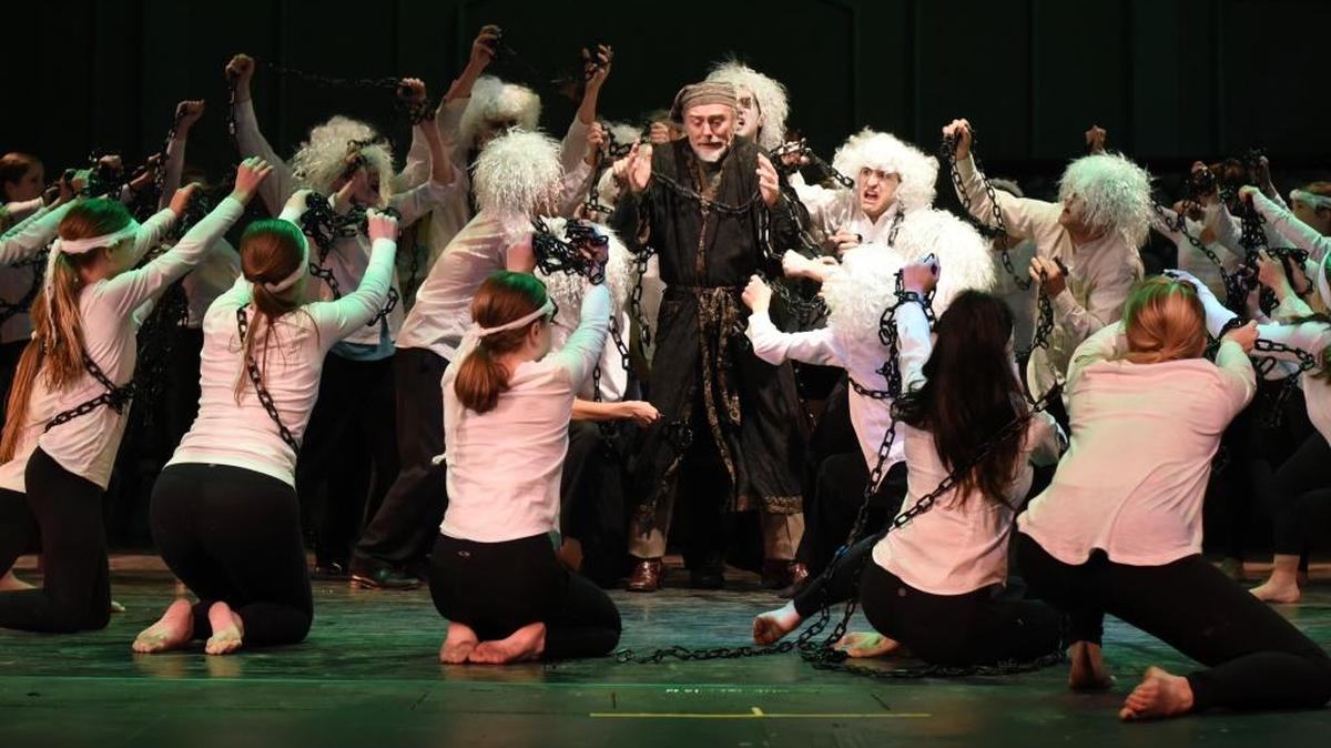 Ghosts descend upon Scrooge (Michael Breeze) in “Link By Link.” The Rep presents “A Christmas Carol -- The Musical” Dec. 16 to 18 at the Guignol Theatre in the University of Kentucky Fine Arts Building.