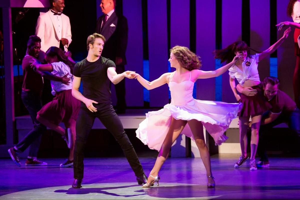 Aaron Patrick Craven plays Johnny Castle and Kaleigh Courts is Baby in “Dirty Dancing — The Classic Story on Stage,” playing this weekend at the Lexington Opera House.