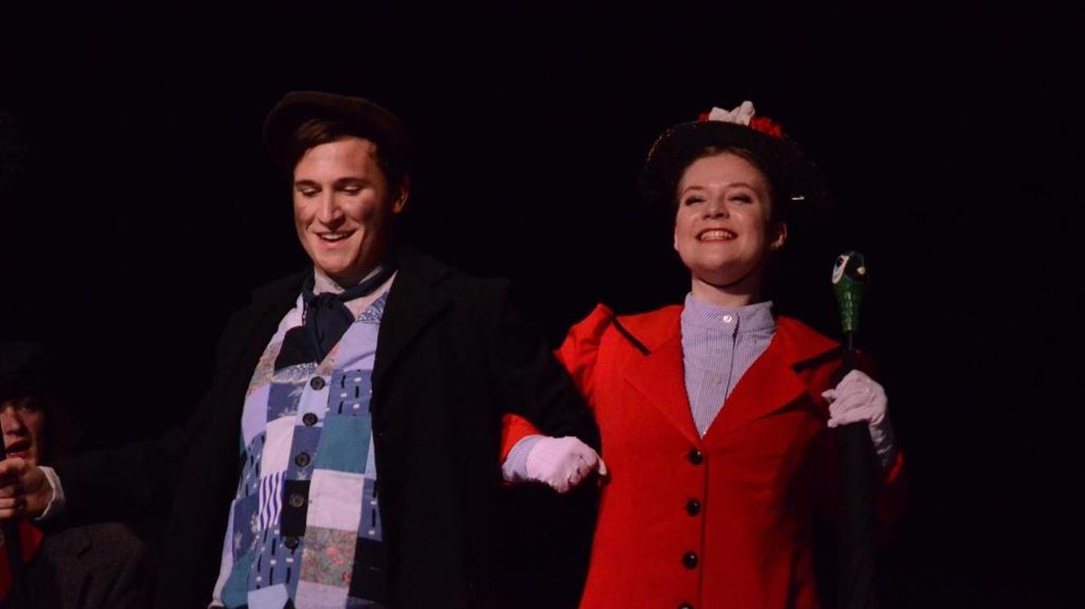 Jake Chafin plays Bert and Mackenzie McConnell stars as the title character in Paul Laurence Dunbar High School’s production of Mary Poppins.