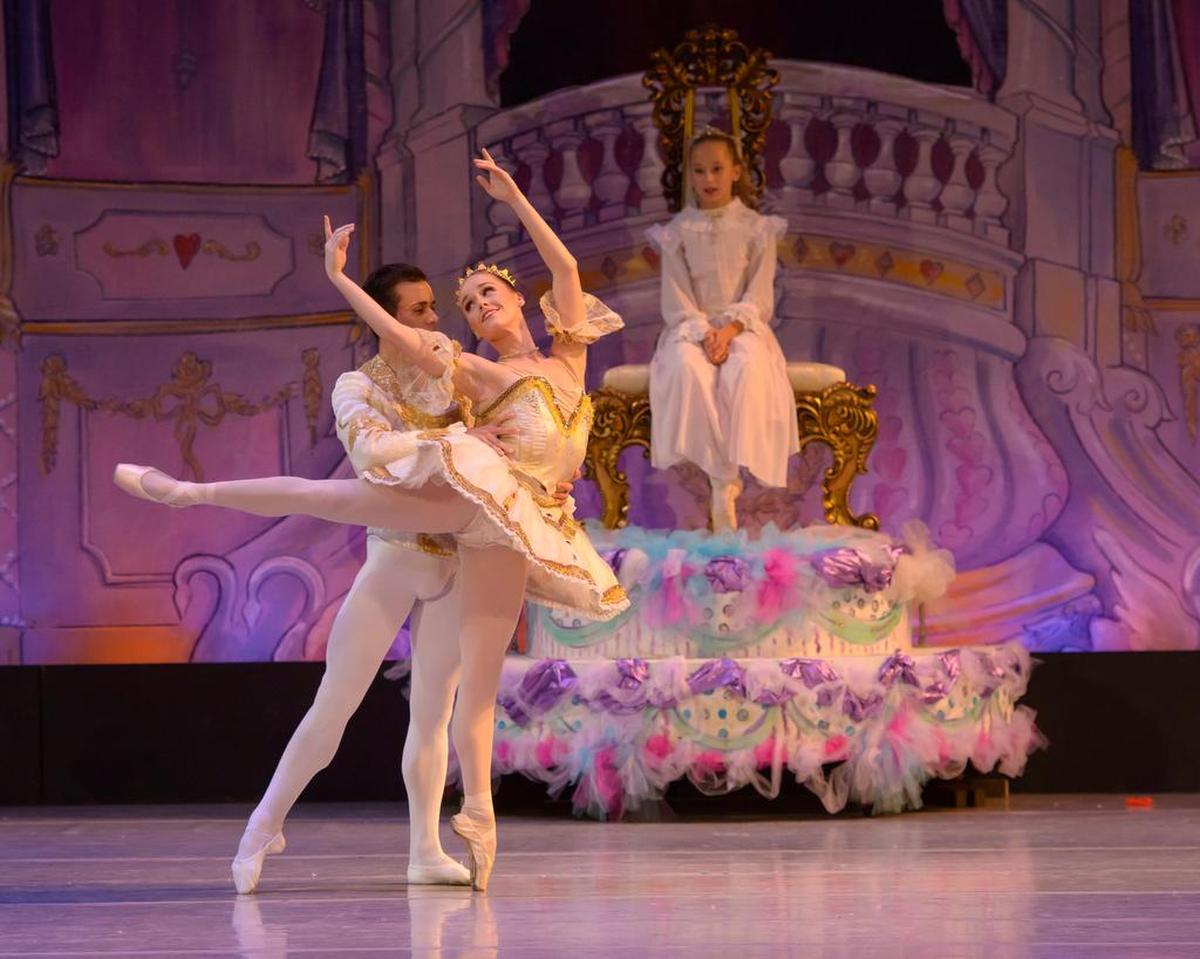 Hana Johnson, right, plays Clara, Jorge Barani is Cavalier and Kelsey Van Tine is the Sugar Plum Fairy in Kentucky Ballet Theatre’s 2017 production of “The Nutcracker.”