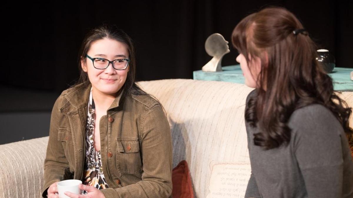 Eileen Doan as Sara, left, and Hannah Daugherty as Callie in a scene from “Stop Kiss,” presented by Studio Players.