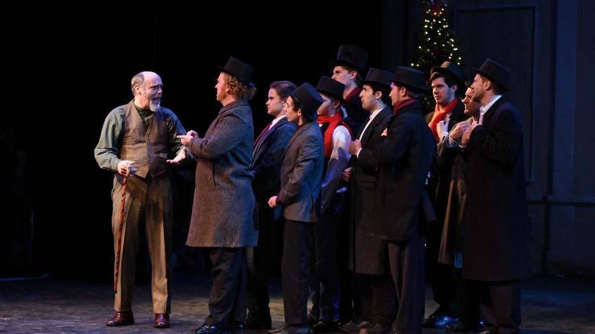 Ebenezer Scrooge (Michael Breeze) rejects a request for donations to the poor on Christmas Eve. The Rep presents “A Christmas Carol -- The Musical” Dec. 16 to 18 at the Guignol Theatre in the University of Kentucky Fine Arts Building.