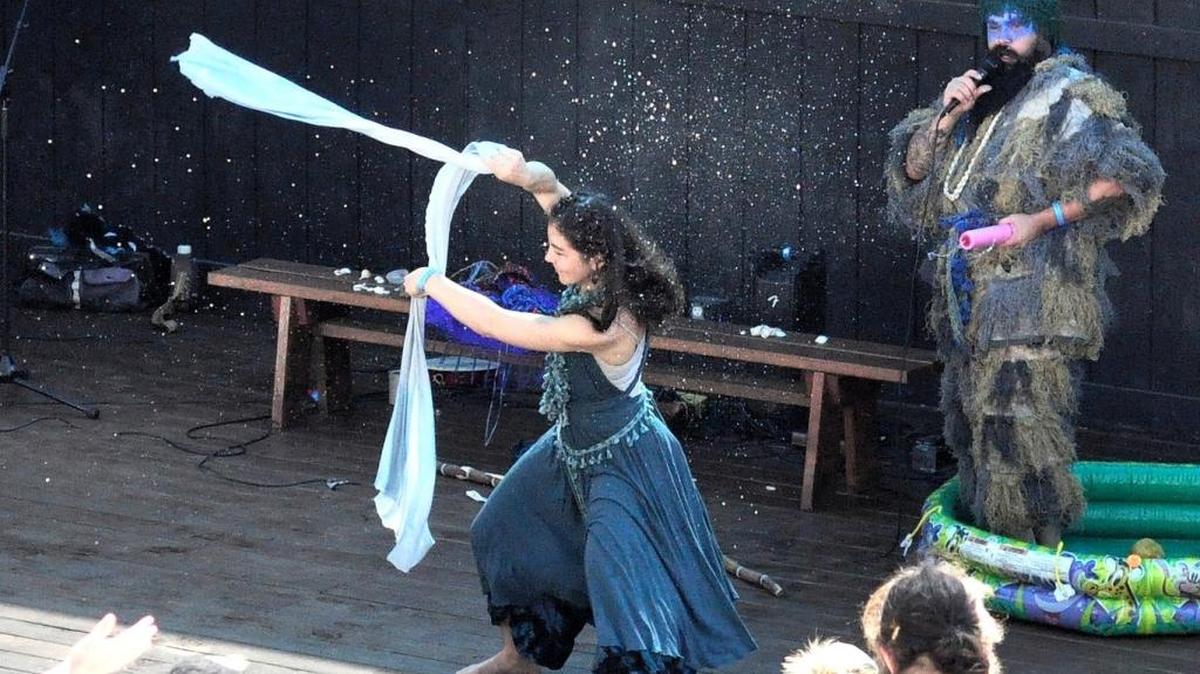 A scene from Holy Fool Arts water show, “Wade in Deep Water,” which portrays Miriam and John the Baptist.