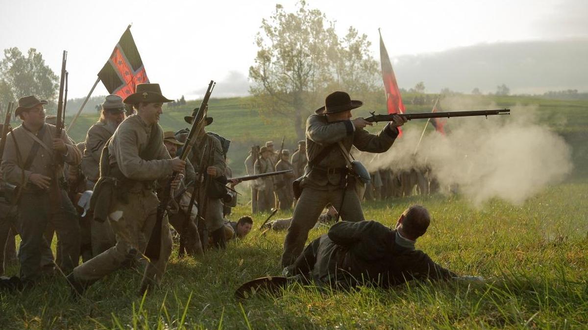 Confederate soldiers advanced toward the Union line during a sunrise reenactment of the Battle of Perryville in 2012.