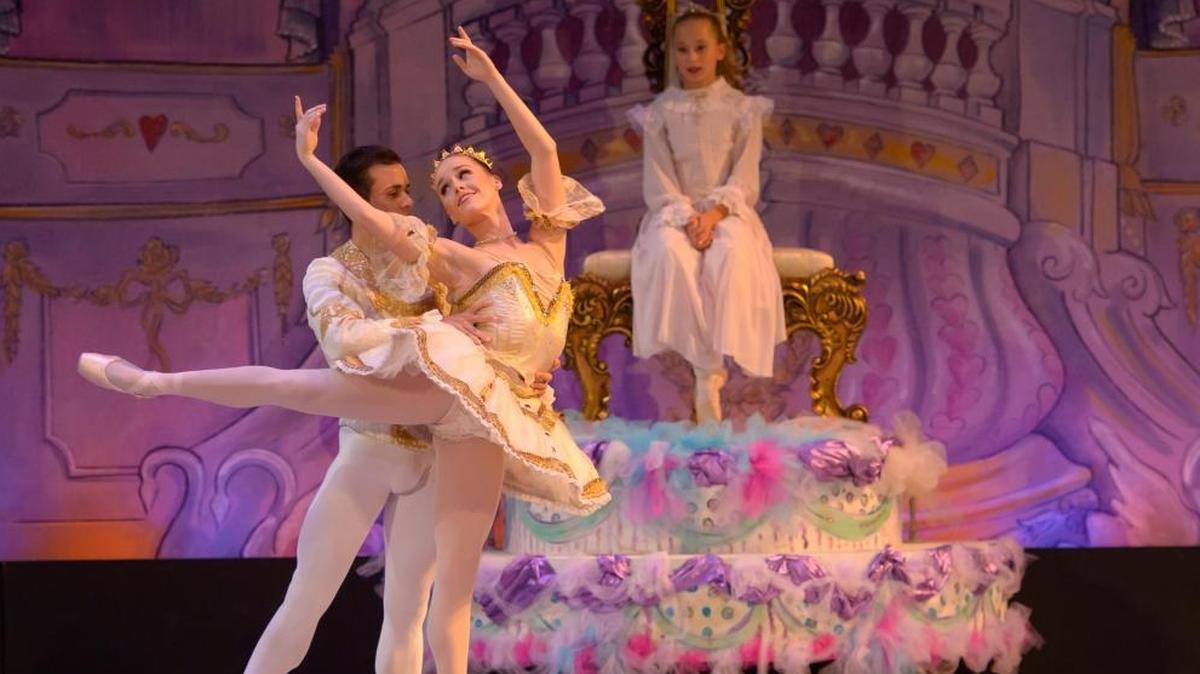 Hana Johnson, right, plays Clara, Jorge Barani is Cavalier and Kelsey Van Tine is the Sugar Plum Fairy in Kentucky Ballet Theatre’s production of “The Nutcracker.”