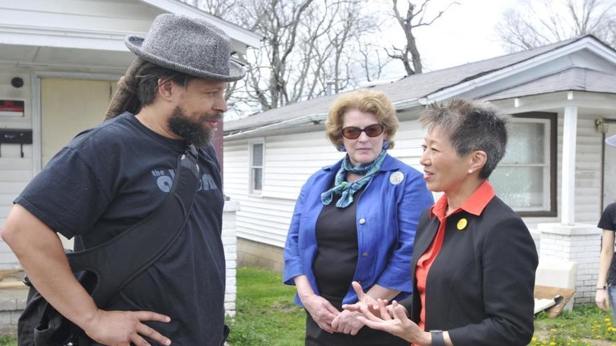 In this 2015 file photo, Lexington artist Hendrick Floyd, one of the first residents of a new artist-oriented housing initiative in the North Limestone neighborhood, talks with National Endowment for the Arts chairwoman Jane Chu (right) and Kentucky Arts Council director Lori Meadows during their tour of the North Limestone neighborhood. Chu was in Lexington for a two-day visit to Kentucky.