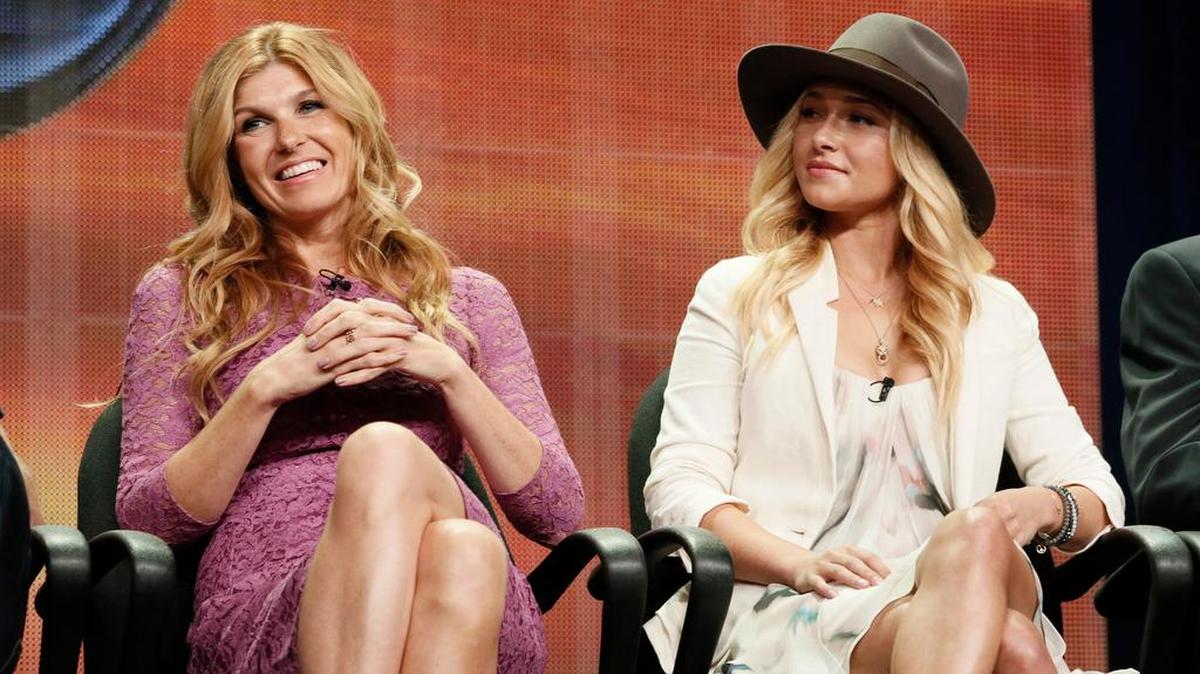 In this July 27, 2012 file photo, cast members Connie Britton and Hayden Panettiere attend the “Nashville” panel at the Disney ABC TCA Day 2 at the Beverly Hilton Hotel, in Beverly Hills, Calif. Cancelled by ABC after four seasons, the new season of “Nashville” on CMT, which begins Jan. 5, 2017, aims to reflect more diversity in both the music and the cast.