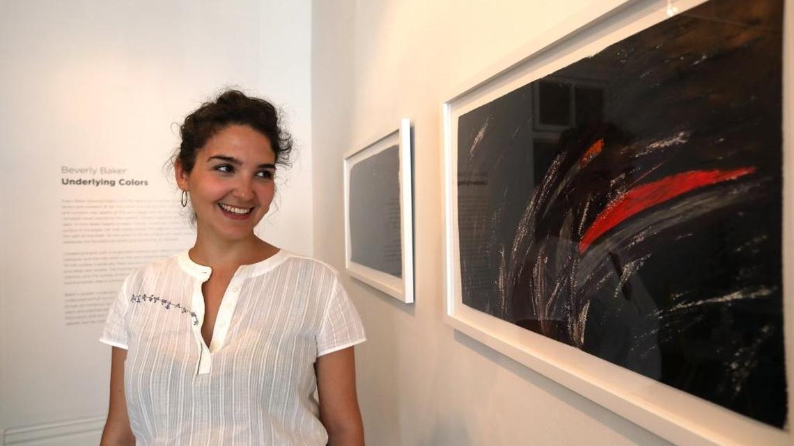 Creative director Maia Ferrari looks at one of the untitled pieces in the Beverly Baker exhibit at Institute 193 in Lexington, Ky., Thursday, June 15, 2017.