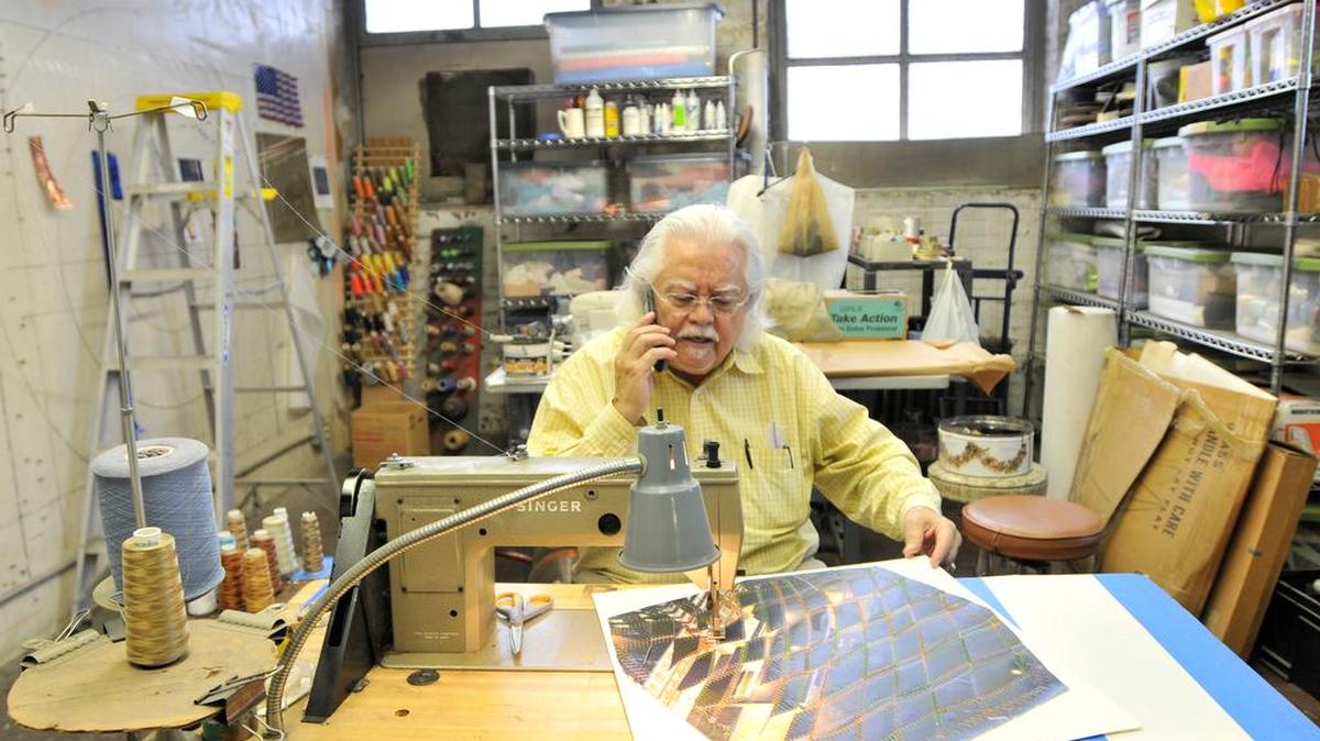 University of Kentucky fiber art professor Arturo Alonzo Sandoval in his studio in the Reynolds Building in 2011. Sandoval’s work will be featured at the Living Arts and Science Center in September and October.