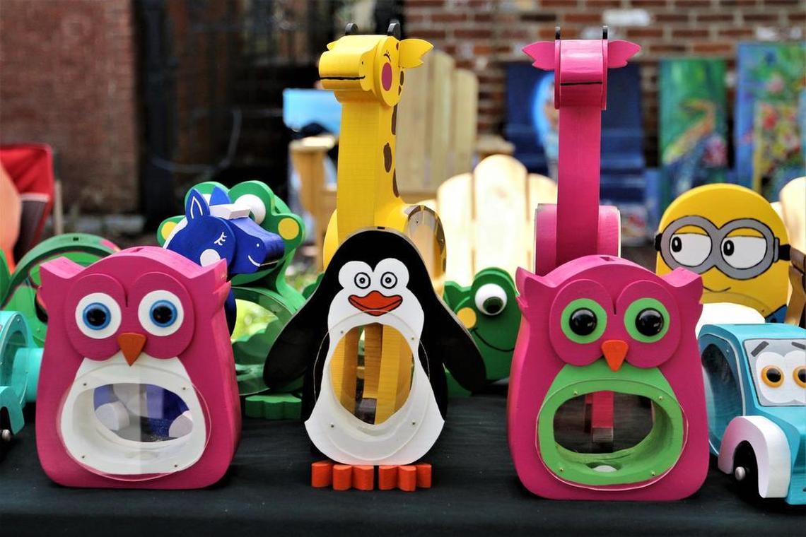 Fairgoers shopped for handmade goods from local and national artists at the 23rd annual Mayfest Arts Fair in downtown Lexington on May 13, 2017. The annual two-day event, held at Gratz Park and the lawn at Transylvania University, continues on Sunday.