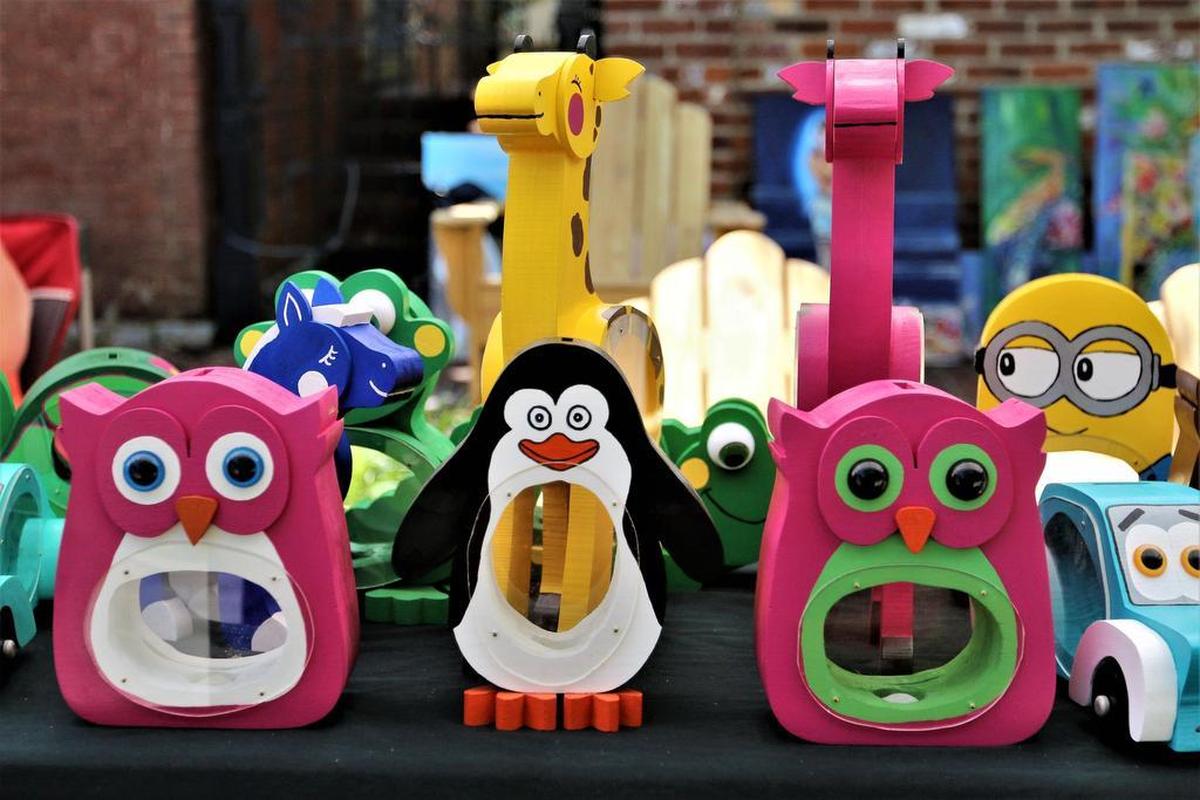 Fairgoers shopped for handmade goods from local and national artists at the 23rd annual Mayfest Arts Fair in downtown Lexington on May 13, 2017. The annual two-day event, held at Gratz Park and the lawn at Transylvania University, continues on Sunday.