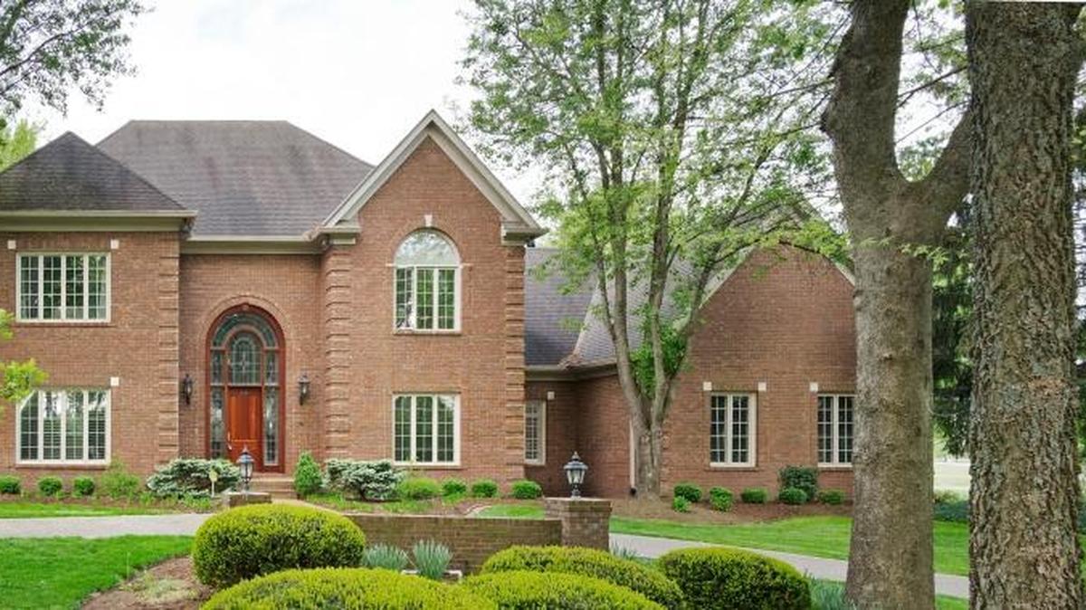 The 7,000 square feet, four-bedroom, two-story brick home at 4 Court of Champions sits on a five-acre lot and is currently on the market.