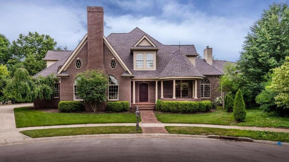 Garden Grove Walk home is rich in custom detail with a charming cottage feel