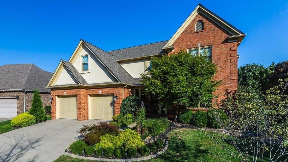Open floor plan and abundant greenspace make for gracious family living in Andover Forest