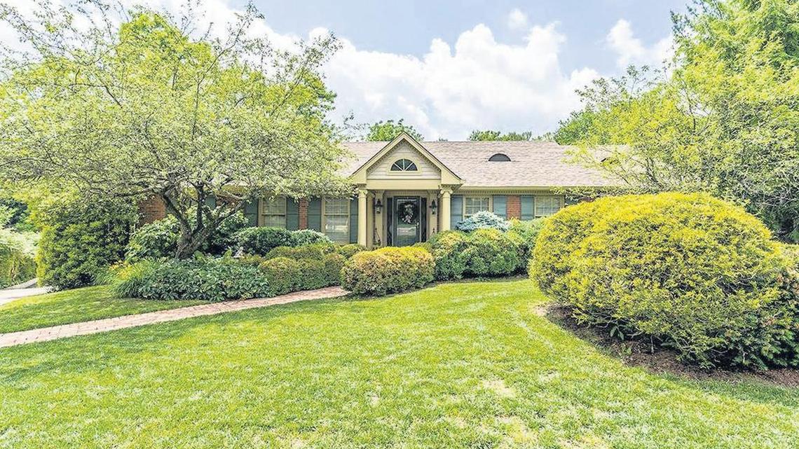 Magic gardens and monumental space make this Shadeland house a home