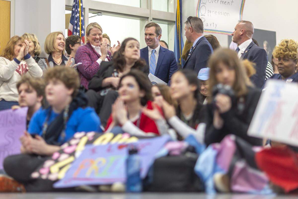 Kentucky Gov. Andy Beshear greets attendees during the Fairness Rally at the Kentucky state Capitol Education Center in Frankfort, Ky., on Wednesday, Feb. 25, 2026.