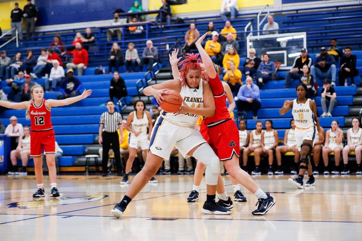 Franklin County’s Jhaven Meade, left, is guarded by Anderson County’s Faith Hyatt during a game in Frankfort on Jan. 19.