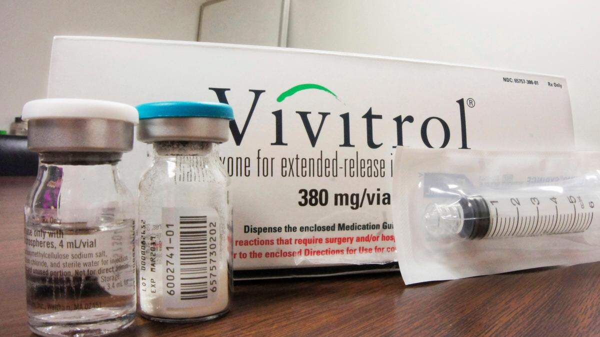 FILE - This Oct. 19, 2016, file photo shows the packaging of Vivitrol at an addiction treatment center. (AP Photo/Carla K. Johnson, File)