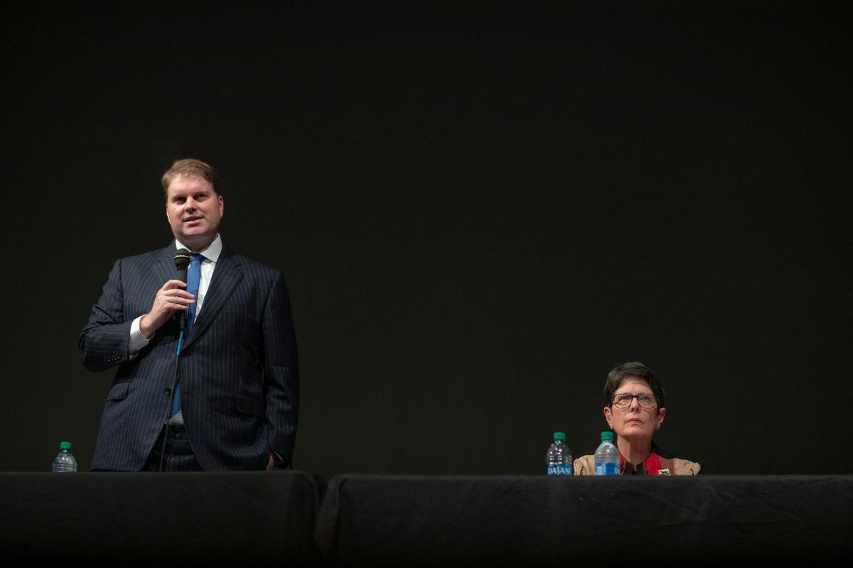 David Kloiber, a candidate for Lexington mayor, speaks while current Mayor Linda Gorton looks on during a candidate forum at the Lyric Theatre and Cultural Arts Center in Lexington, Ky., on Wednesday, Sept. 14, 2022.