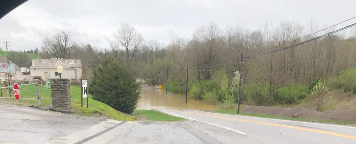 Floodwaters on Flour Creek Road in Butler, Kentucky, on April 5, 2024. Officials in Pendleton County issued an emergency evacuation for Butler and Falmouth as the Licking River continued to rise.