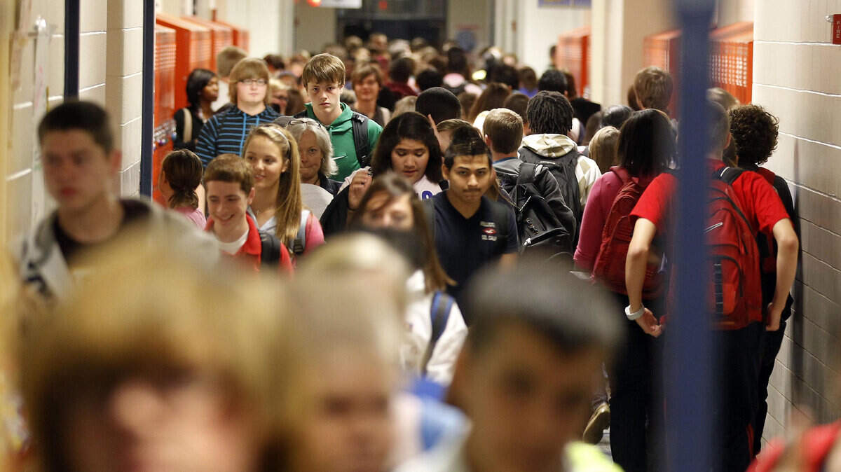 The hallways were packed as students made their way to their next  class during class change at Henry Clay High School on Fontaine Rd.  in Lexington, Ky., Friday, September 23, 2011.Total enrollment in  the Fayette schools has reached about 40,000 students in 2012. This is posing an inconvenience now, but promises to become a problem as growth continues. Henry clay is the most overcrowded high school in  Fayette County. Charles Bertram | Staff