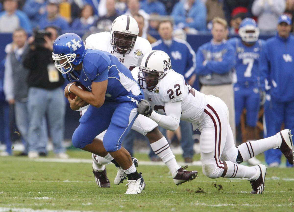 Kentucky quarterback Andre Woodson was sacked three times and the Cats turned the ball over six times in a 31-14 upset loss to Mississippi State that derailed UK’s bid for “a special season” in 2007.
