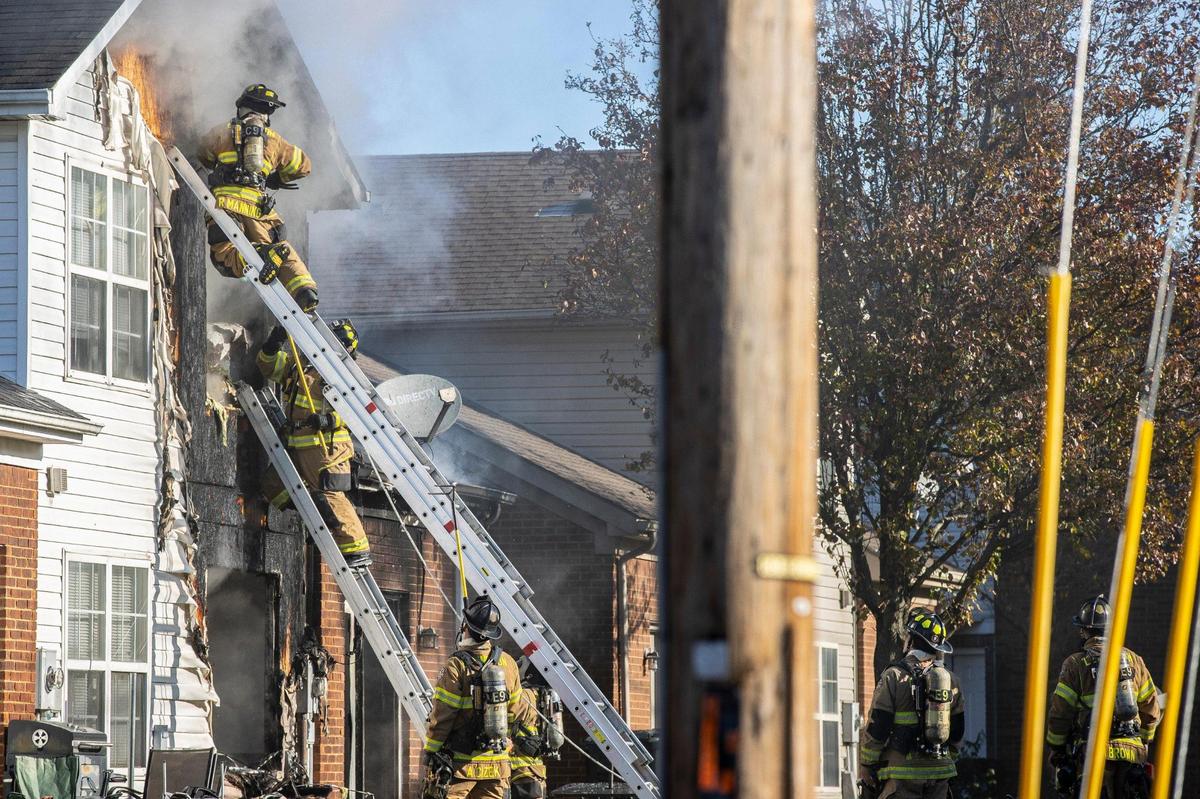 Lexington firefighters fought to extinguish the fire that heavily damaged the duplex.