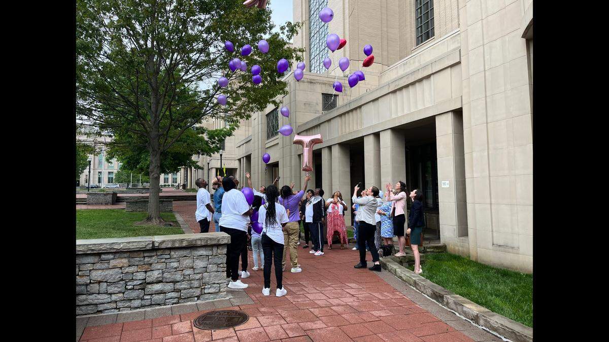 Members of Talina Henderson’s family release balloons after Henderson’s killer, Stephon Henderson, was sentenced to 26 years in prison for killing Talina in November 2022.