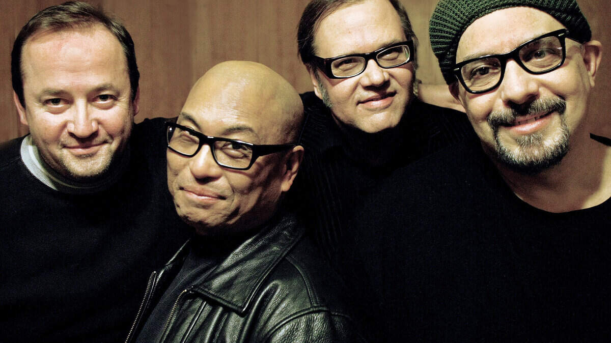 The Smithereens, from left: Jim Babjak, Severo "The Thrilla" Jornacion, Dennis Diken and Pat DiNizio. The group performs at Christ the King's Oktoberfest on Friday night.      