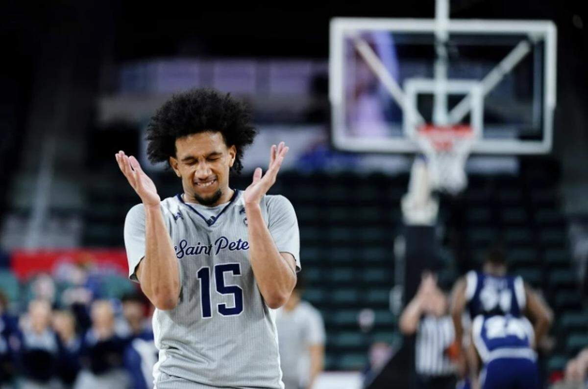St. Peter’s Matthew Lee reacts during the second half of an NCAA college basketball game against Monmouth during the championship of the Metro Atlantic Athletic Conference tournament, Saturday, March 12, 2022, in Atlantic City, N.J. St. Peter’s won 60-54. (AP Photo/Matt Rourke)(Matt Rourke / Associated Press)
