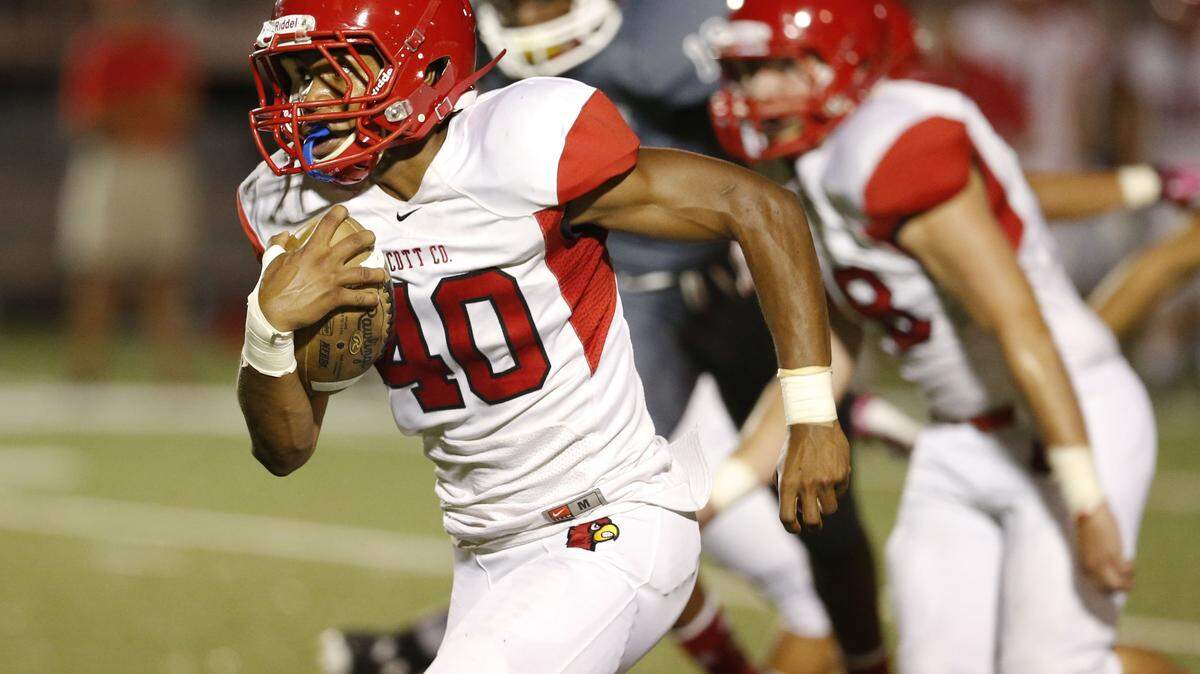 Scott County's Keith Guy (40) is one of three Cardinals to have rushed for more than 1,000 yards this season.  