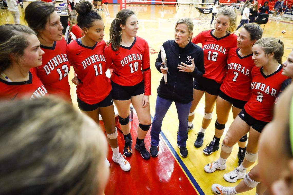 Paul Laurence Dunbar head coach Jennifer Morgan spoke to her players before the 11th Region volleyball tournament finals against Tates Creek in 2018. They were 11th Region champs that year.