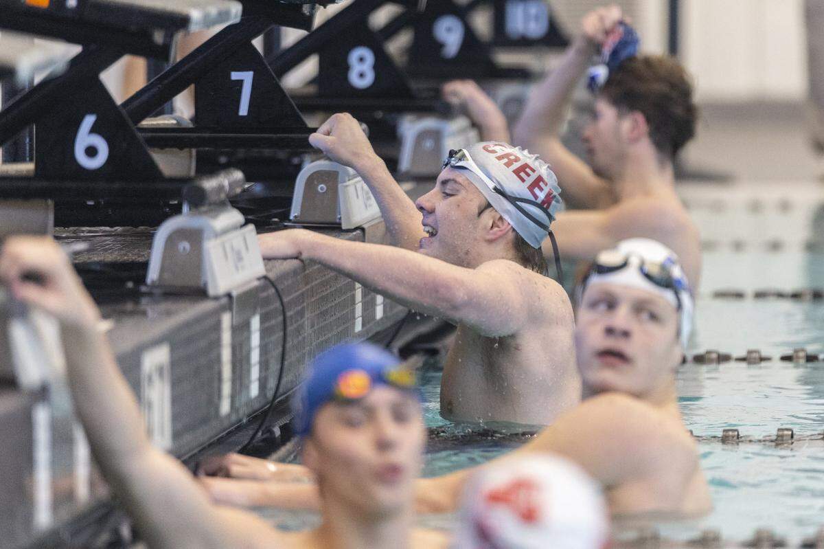 Tates Creek's Caleb Strunk celebrates after winning the boy's 400-yard freestyle relay during the 8th Region Swimming Championships at Centre College in Danville, Ky., on Thursday, Jan. 22, 2026.
