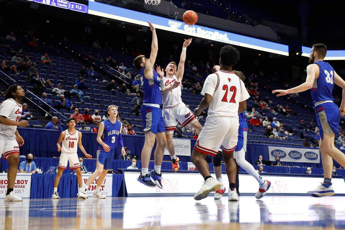 George Rogers Clark’s Aden Slone (4) shoots over Oldham County’s Samuel Powell (32) during Wednesday night’s game.