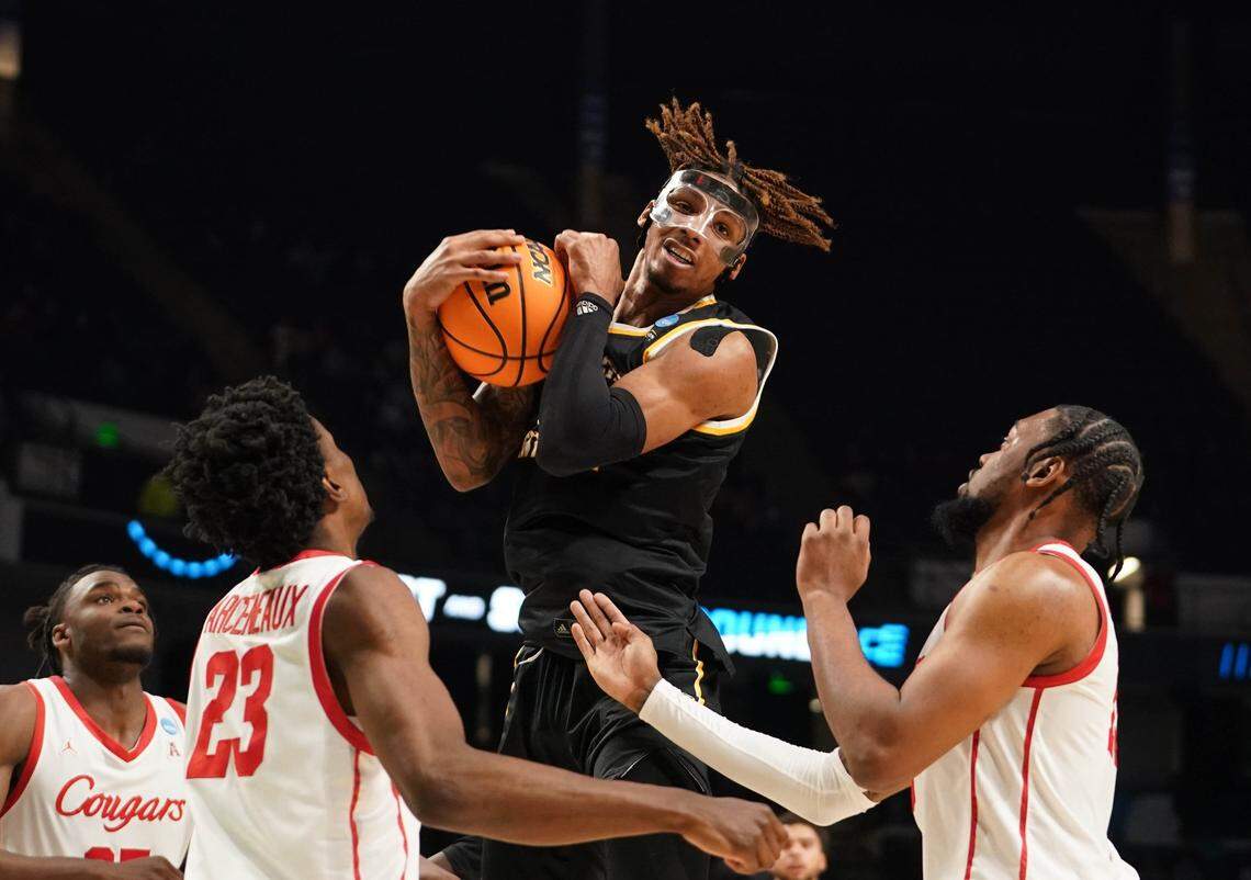 Chris Brandon (21) sparked the Norse with 14 rebounds, including seven on the offensive end.