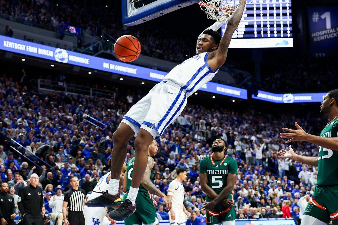 Kentucky’s Justin Edwards dunks against Miami during Tuesday’s ACC/SEC Challenge game at Rupp Arena. The Wildcats made almost 60 percent of their shots from the field in the win.