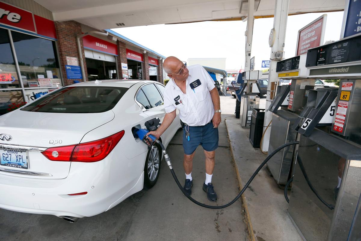 Owner Kermit Dixon filled Sue Wylie’s car with gas at Dixon’s Service Center, 220 Southland Drive in Lexington. Dixon’s is believed to be the last full-service gas station in Lexington.