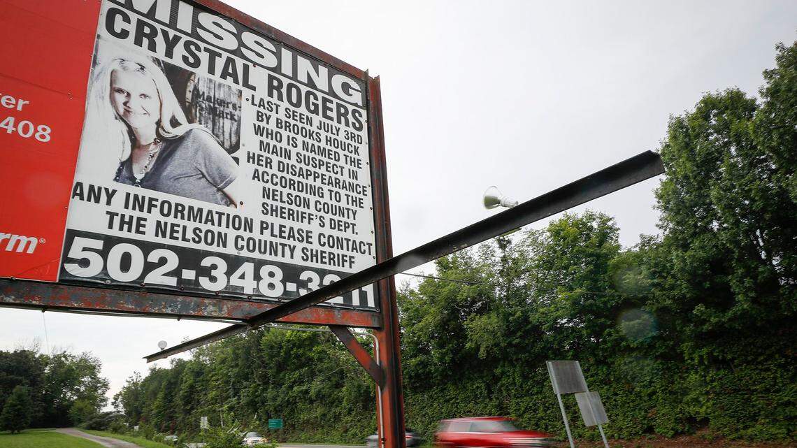 Motorists pass a billboard on Springfield Road asking for information in the disappearance of Crystal Rogers In Bardstown, Ky., Wednesday, Aug. 25, 2021. Rogers was first reported missing in the summer of 2015.