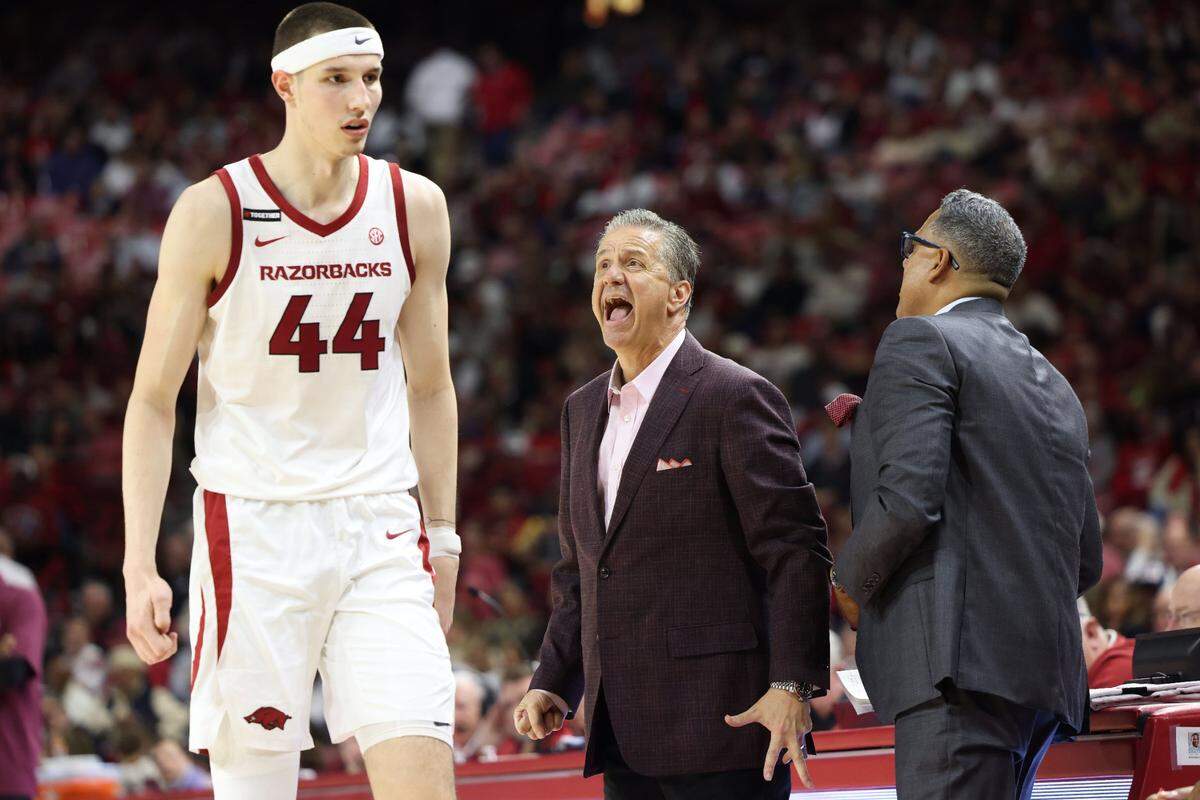 Arkansas head coach John Calipari talks to forward Zvonimir Ivisic (44) during the second half against Little Rock on Nov. 22, 2024.