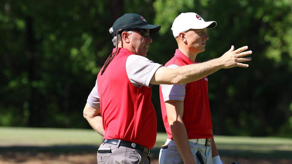 Western Kentucky University head men's golf coach Phillip Hatchett died early Sunday after he was hit by a vehicle while biking.