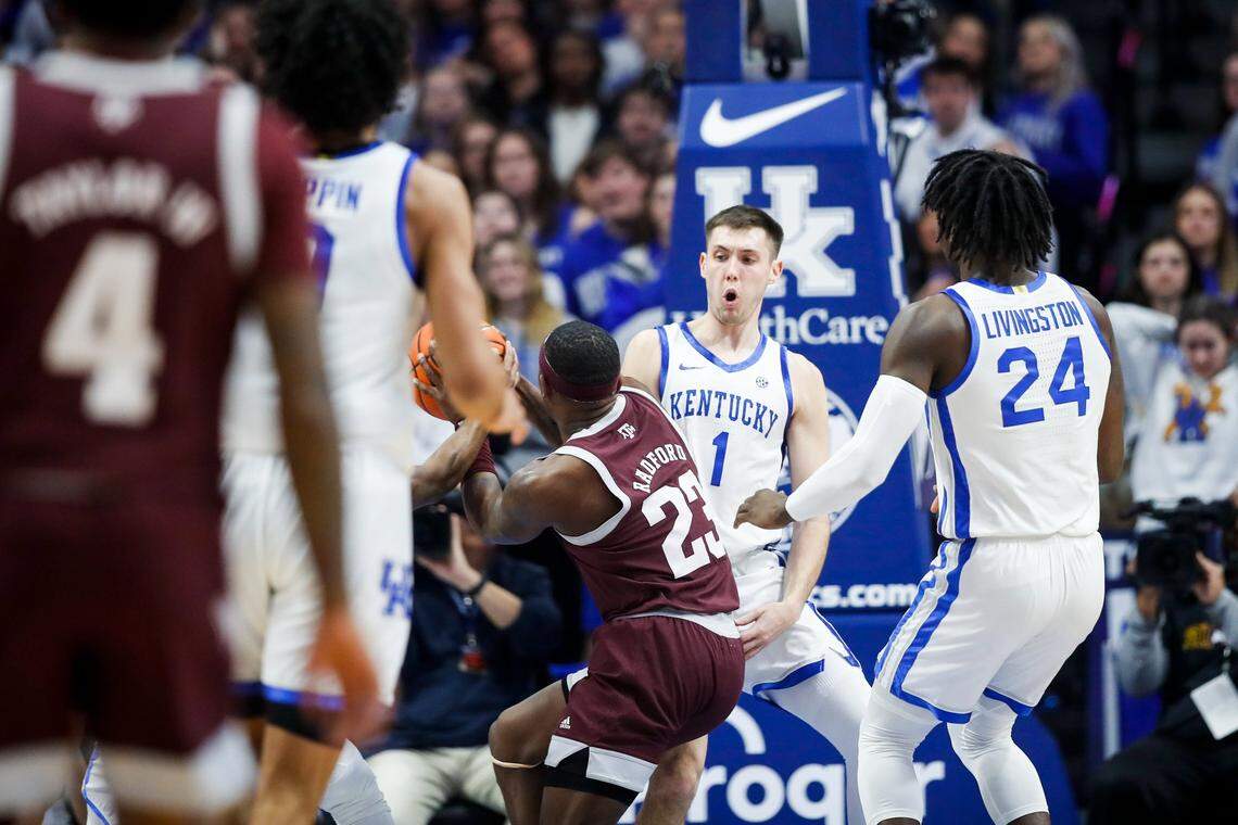 Kentucky’s CJ Fredrick draws a charge against Texas A&M on Saturday, Jan. 21, 2023, at Rupp Arena in Lexington, Ky.