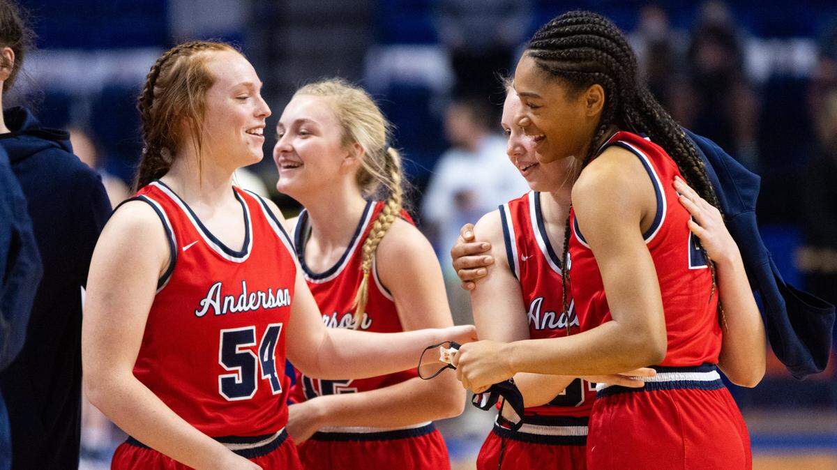 Anderson County players celebrate their advancement to the Sweet 16 semifinals as the clock wound down on Friday’s victory over Franklin County in Rupp Arena.