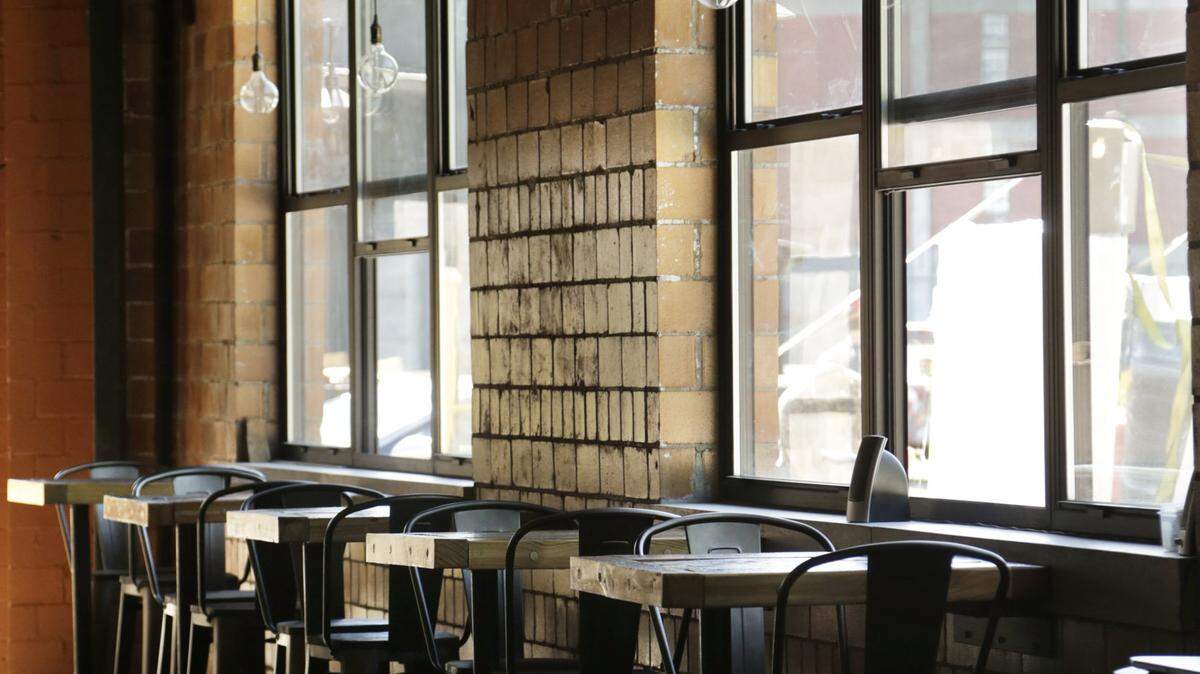 Window seating at Middle Fork Kitchen Bar in the Pepper Distillery campus on Manchester St. Lexington, Ky., on May 12, 2015. The restaurant will open soon with a similar lunch menu as owner  	Mark Jensen's food truck, Fork in the Road. The dinner menu has not been announced yet. Photo by Pablo Alcala | Staff