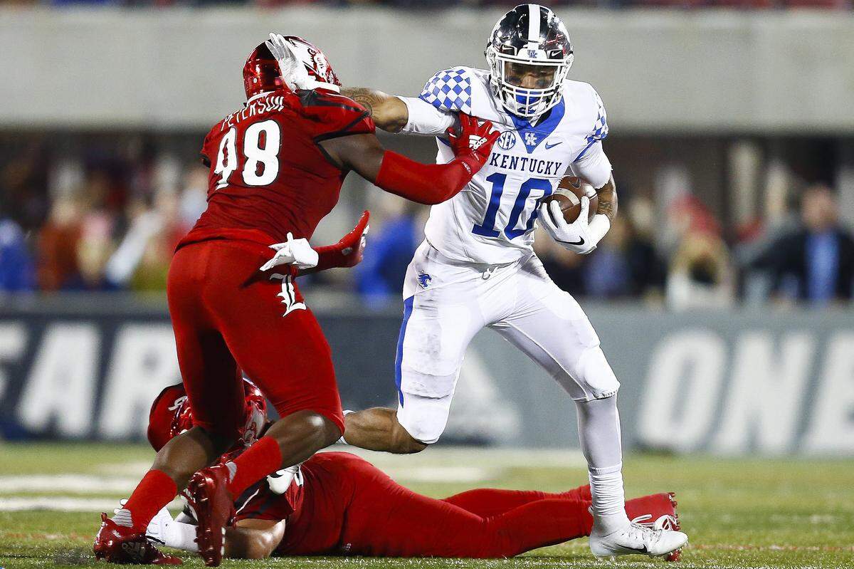 A.J. Rose (10) will be Kentucky’s top returning running back next season. The 6-foot-1, 208-pound sophomore ran for 442 yards and had a 75-yard touchdown run in UK’s 56-10 pasting of Louisville.