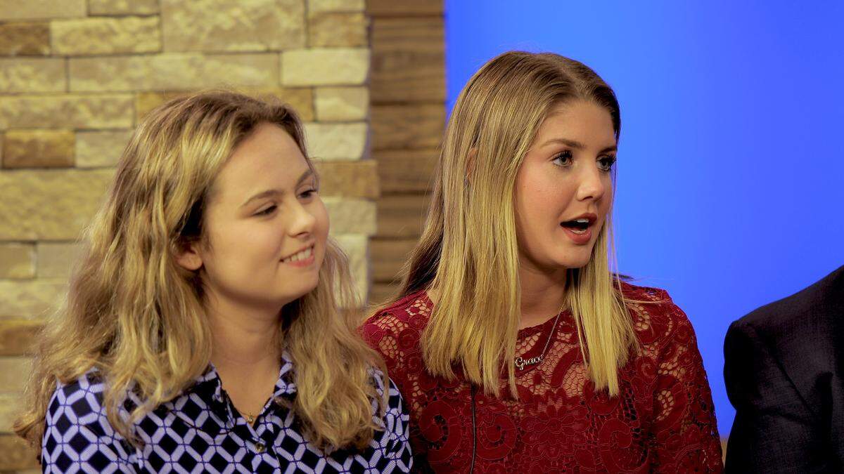 Grace Hager, right, a Lexington Christian Academy tennis player, conducted an interview with fellow intern Karson Purdy, left, a Frederick Douglass lacrosse player, for “Scholastic Ball Report.”