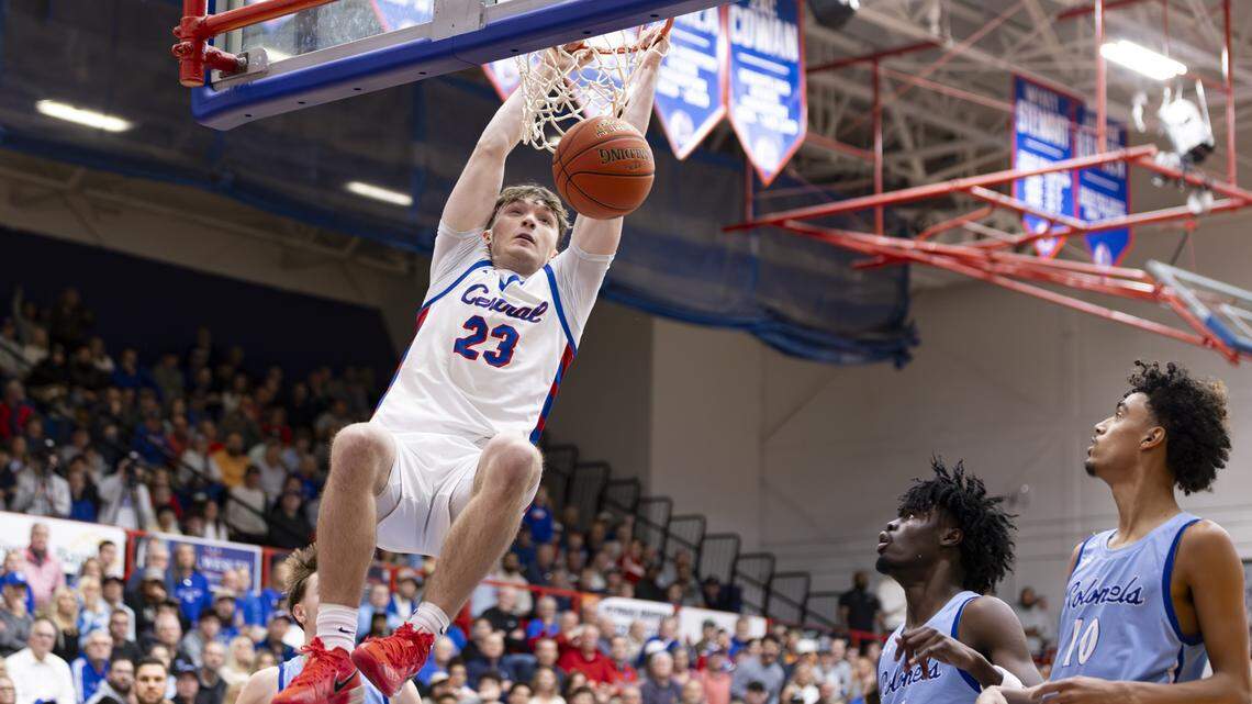 Madison Central’s Luke Asher (23) dunked on a fast break against Covington Catholic in the Indians’ 70-60 win at Madison Central High School in Richmond on Friday.